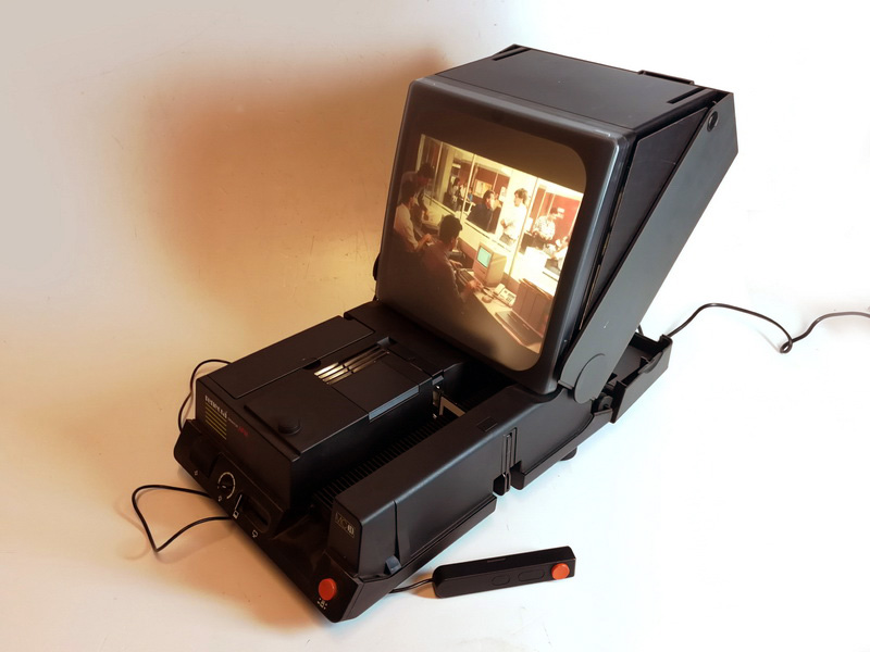 proyector diapositivas con pantalla mando funciona 19x42x29cerrado 40x56x29abierto